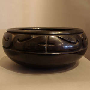 Geometric design carved into a black bowl