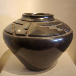 Geometric design carved in a black jar