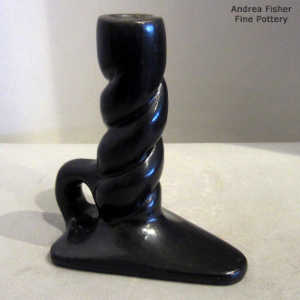 Polished black candlestick holder