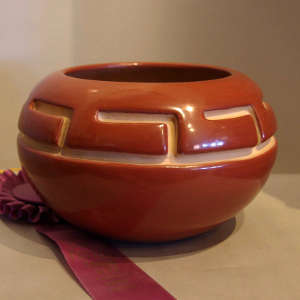 Geometric design carved in a red jar