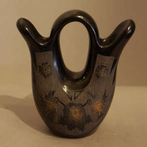 Sgraffito hummingbird and floral design on a black wedding vase