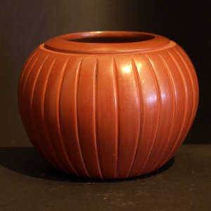 Carved red melon jar