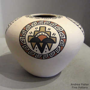 Feather and stormcloud medallion design on a polychrome jar