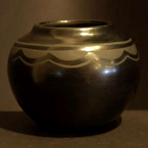 Geometric design on a black on black jar