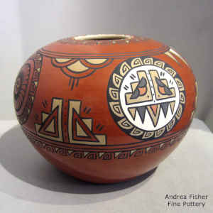 4-panel medallion, kiva-step and geometric design on a polychrome jar