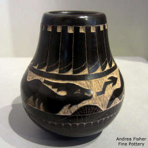 Sgraffito double avanyu, feathers and geometric design on a black jar