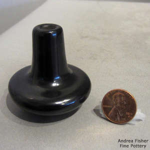 Plain black miniature jar