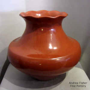 Red water jar with a pie crust rim