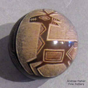Sgraffito Mimbres-style deer and geometric design on a miniature black seed pot with a sienna spot