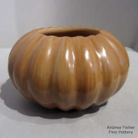 Red jar carved with a melon design