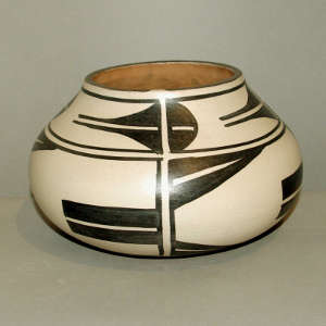 Black and white geometric design on a polychrome jar