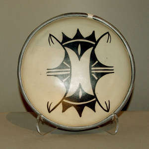 Geometric design inside and out on a polychrome bowl