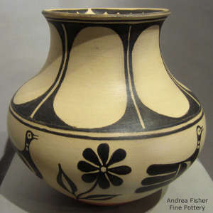 Bird, floral and geometric design on a polychrome jar