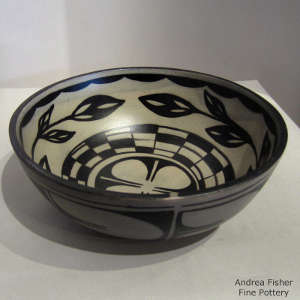Geometric design inside and out on a polychrome bowl