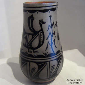 Bird, corn and geometric design on a polychrome jar