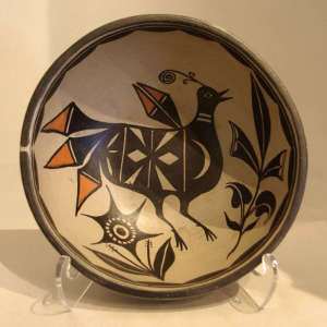 Bird, floral and geometric designs on a polychrome bowl