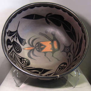 Bird, floral and geometric design on a polychrome bowl