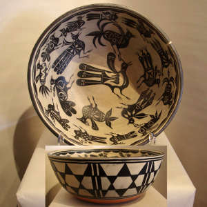 Bird design inside and geometric design outside on a polychrome dough bowl
