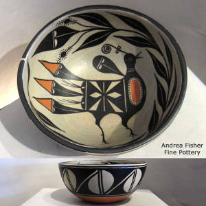 Bird and floral design on the inside of this polychrome bowl and a geometric design on the outside