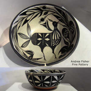 Black and white bird and floral design inside with geometric design outside on a polychrome jar