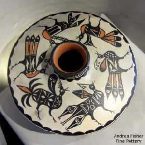 Bird and geometric design on this low-shoulder polychrome jar