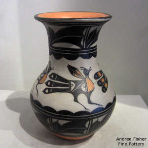 Bird, cloud and geometric design on this polychrome vase