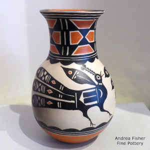 Bird and geometric design on a polychrome jar