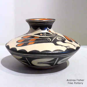 Bird and geometric design on a low-shoulder polychrome jar