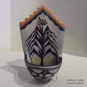 Corn plant and geometric design on a polychrome wall plaque