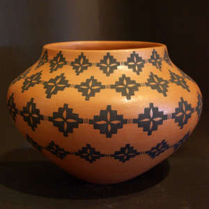 Kiva step and geometric designs on a golden micacous jar