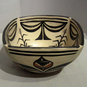 Traditional designs inside and out on a square polychrome bowl