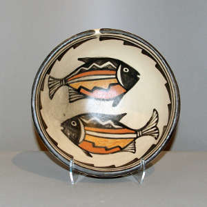 Fish and geometric design on a polychrome bowl