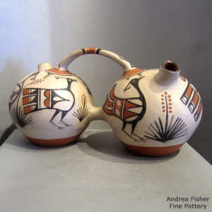 Bird and floral design on a polychrome double canteen