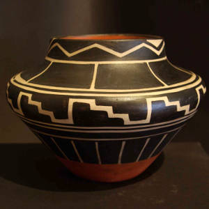 Black and white geometric design on a polychrome jar