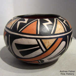 4-direction lightning bolt, cloud and geometric design on a polychrome jar