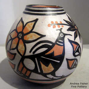 Bird, floral and geometric design on a polychrome jar