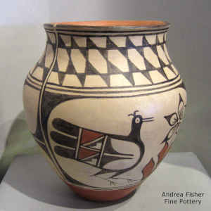 Bird, flower and geometric design on a polychrome jar