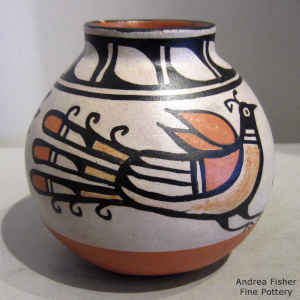 Bird, branch and geometric design on a polychrome jar