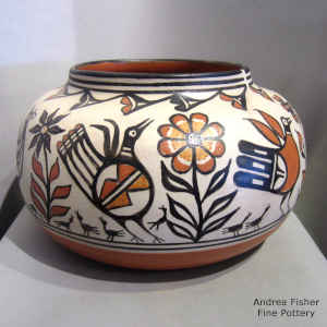 Bird, flower and geometric design on a polychrome jar