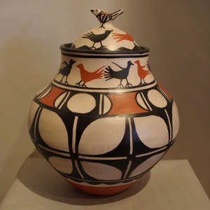 Bird and geometric design on a lidded polychrome jar
