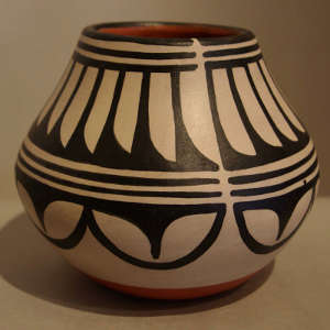 Feather and geometric design on a polychrome jar