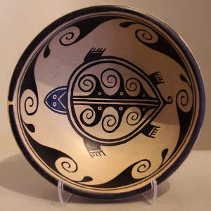Turtle and geometric design on a polychrome chili bowl