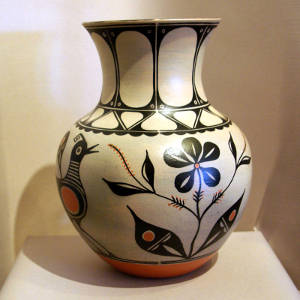 Flower, bird and geometric designs on a polychrome jar