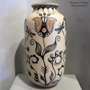 Water, dragonfly, cotton and geometric design on a tall polychrome jar