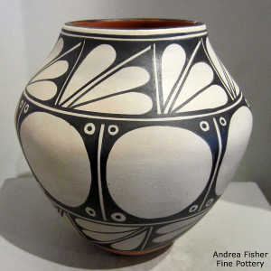 Black and white geometric design on a polychrome jar