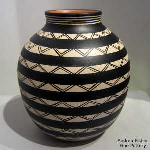 Black and white geometric design on a polychrome jar