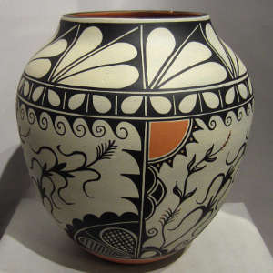 Traditional corn and geometric design on a polychrome jar