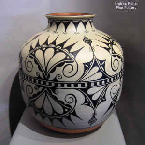 Cotton flower and geometric design on a polychrome jar