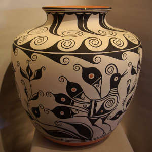 Bird, floral and geometric design on a polychrome jar