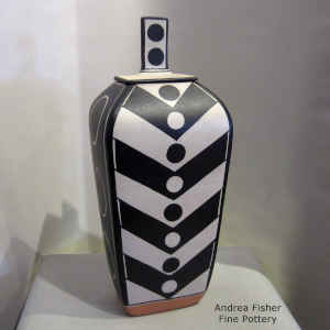 Bold geometric design on a polychrome lidded jar